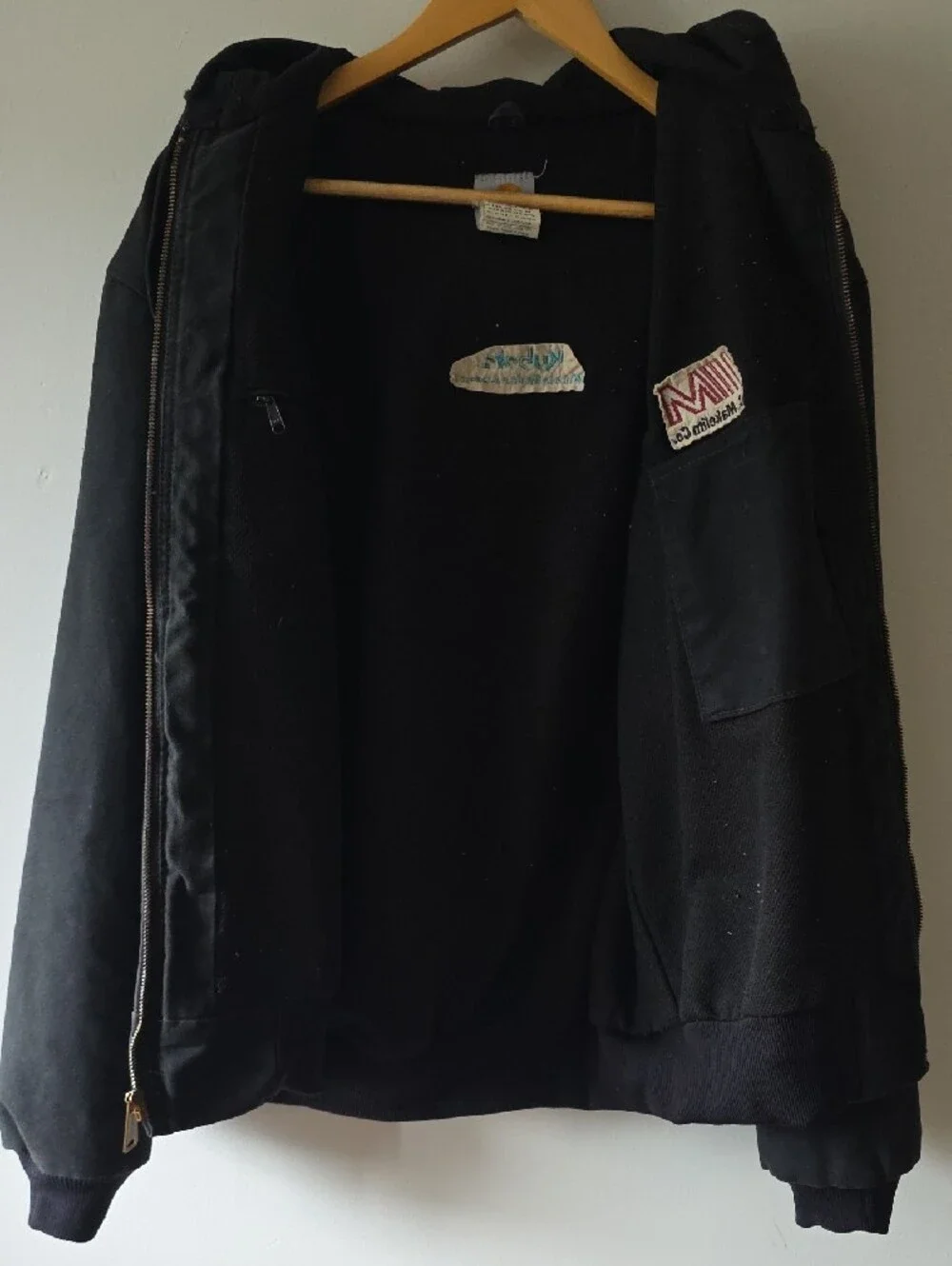 Carhartt Black Zip Hooded Work Jacket with Red Logo Accent